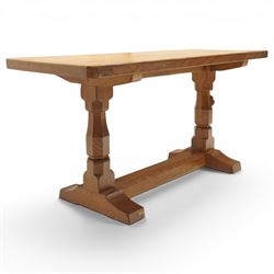 Mouseman - adzed oak rectangular refectory style coffee table, with rectangular adzed top, raised on octagonal supports united by a stretcher, with carved mouse signature, by the workshop of Robert Thompson of Kilburn