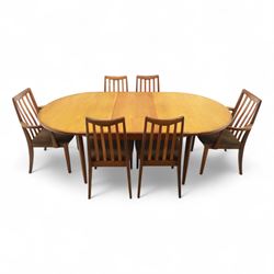 G Plan - mid-20th century teak extending dining table, oval top with integrated extension leaf, raised on tapering legs, together with a set of six slat back dining chairs including two carvers, upholstered in dark green velour (Extends to 210cm)