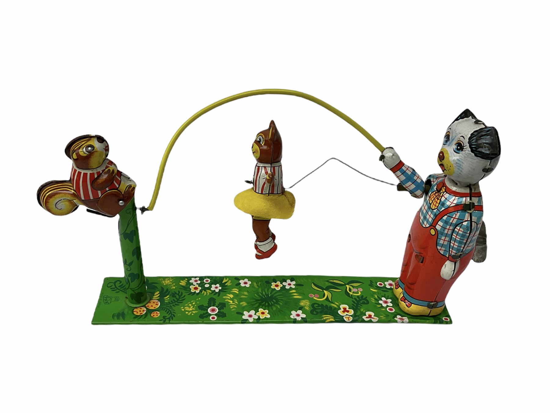 Gebruder Bing Germany Pigmyphone child's portable toy gramophone in woodgrain finish tin-plate box with key and tin of needles L15cm; and nine small records of nursery rhymes; together with a Japanese tin-pate 'Skip Rope Animals' clockwork toy, boxed.