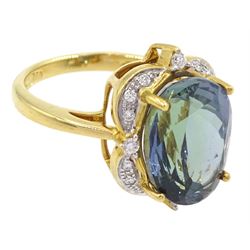 18ct gold oval cut fancy colour tanzanite and round brilliant cut diamond cluster ring, hallmarked, tanzanite approx 9.00 carat