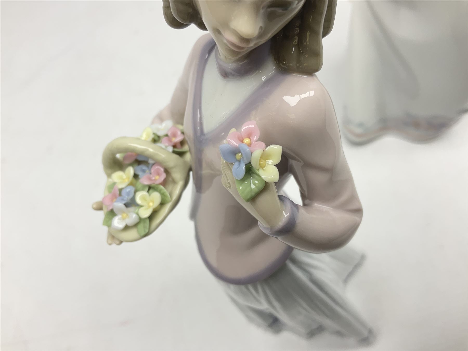 Two Lladro figures, comprising Innocence in Bloom no 7644 and Afternoon Promenade no 7636, both with original box, H28cm
