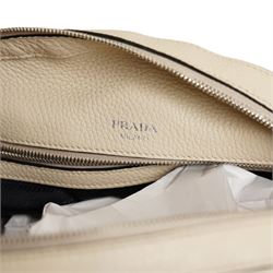Prada - Bauletto handbag in Quarzo Vitello Daino pebbled calf leather with black piping, with twin leather top handles, silver-tone Prada Milano logo and hardware, zip top fastening, detachable and adjustable shoulder strap and leather clochette, with authenticity cards and original Prada dust bag