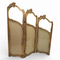 Rococo style giltwood three-panel dressing screen, each panel with shaped and scroll carve...