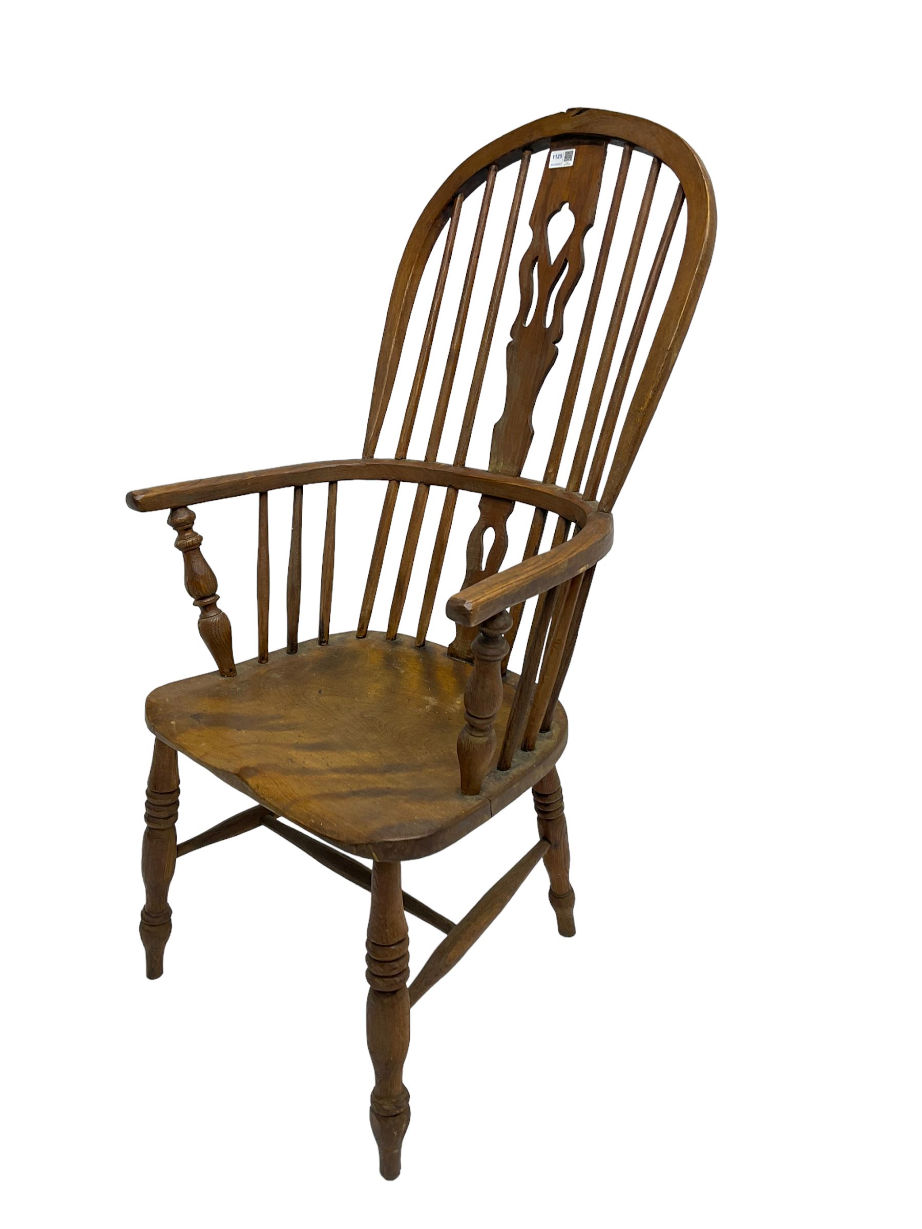 19th century elm and beech Windsor armchair, stick back with pierced splat, on turned supports with H-shaped stretchers