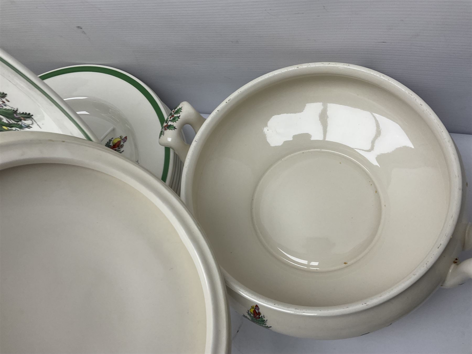 Collection of Spode Christmas Tree pattern part dinner service, comprising three covered tureens, eight dinner plates, eight side plates, eight dessert plates, sauce boat and saucer and serving platter (30)