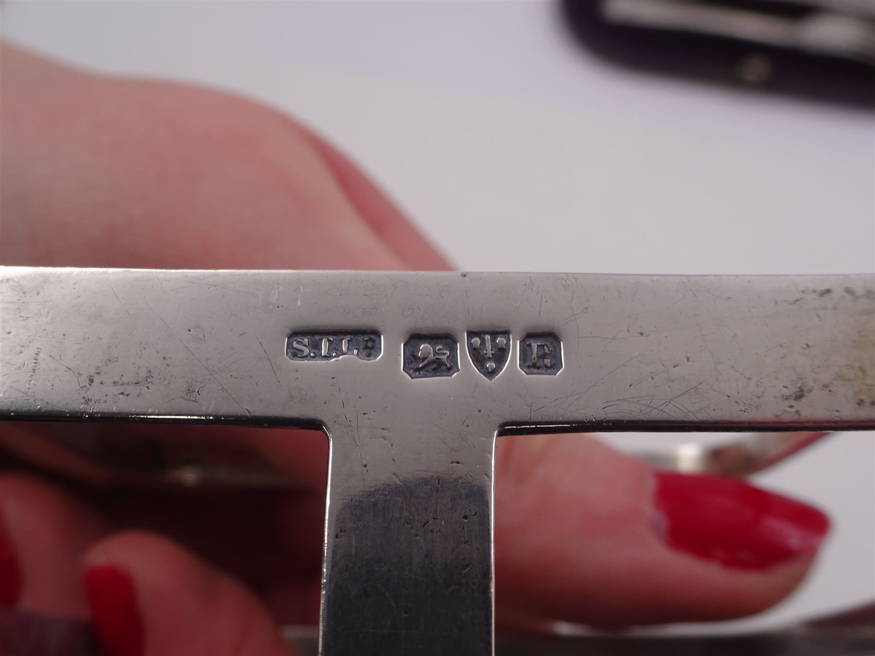 Victorian silver five bar toast rack, hallmarked Stokes & Ireland Ltd, together with Victorian silver fork and spoon set, each with beaded rims, hallmarked London 1896, William Hutton & Sons Ltd, toast rack H8cm