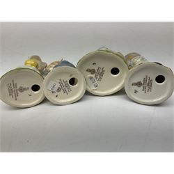 Fifteen Royal Doulton Brambly Hedge figures, comprising Wilfred Toadflax, Dusty Dogwood, Mrs Toadflax, Mr Apple, Primrose Woodmouse, Lord Woodmouse, Poppy Everbright, two Lady Woodmouse, two Old Mrs Everbright, Mr Toadflax, Mrs Apple, Santa Bunnykins and Bunnykins, together with three Royal Albert Wind in the Willows figures comprising Ratty, Badger and Mole, all with printed marks beneath (18)