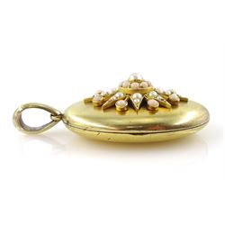 Victorian 15ct gold locket pendant, the centre with applied pearl and coral decoration, stamped 15