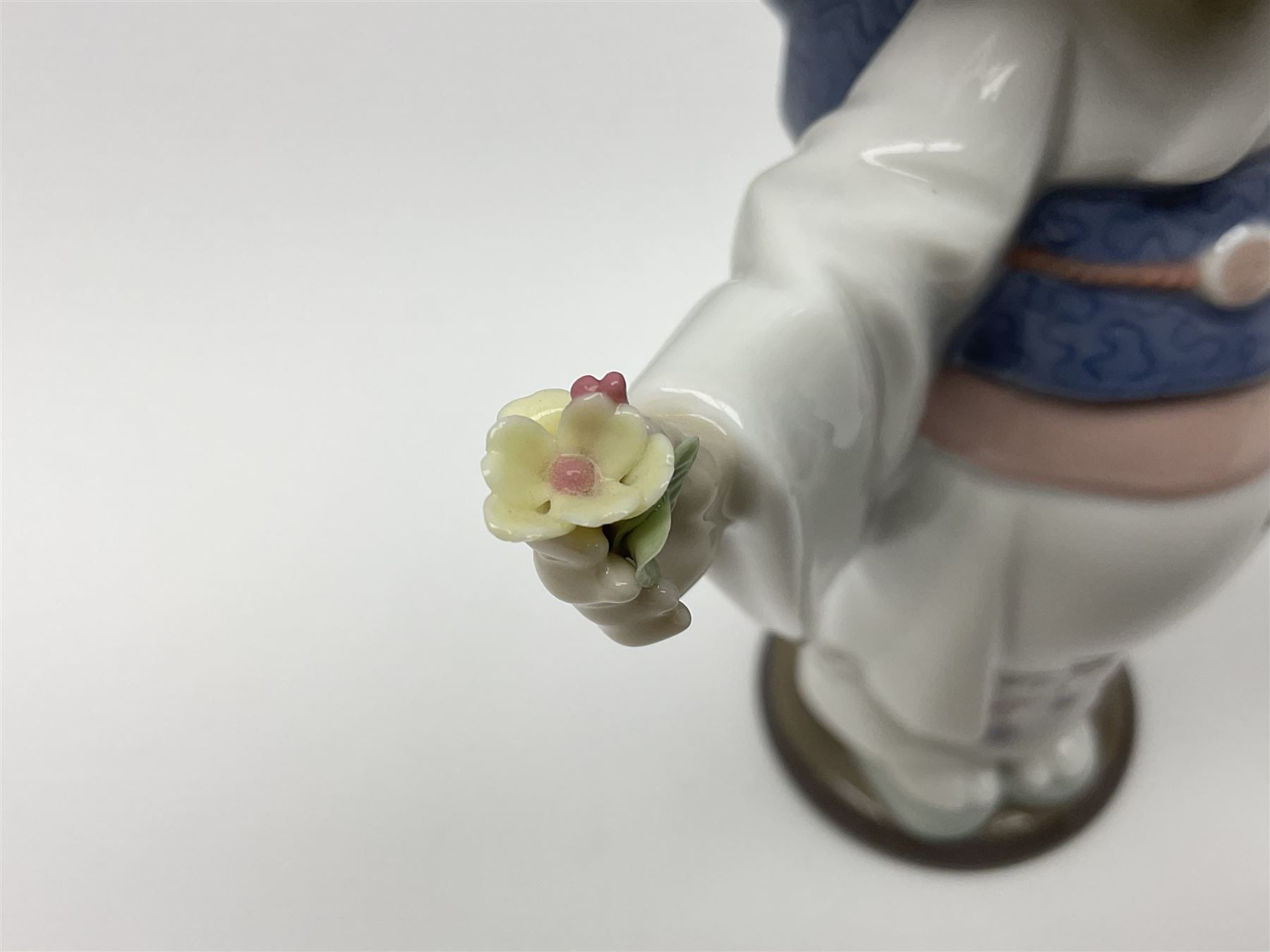 Six Lladro figures of the China doll set and Oriental doll set, comprising Playing the Flute no.6150, Bearing Flowers no.6151, Flower Gazer no. 6152, Oriental Dance no. 6230, Oriental Lantern no. 6231 and Oriental Beauty no. 6232, largest H20cm