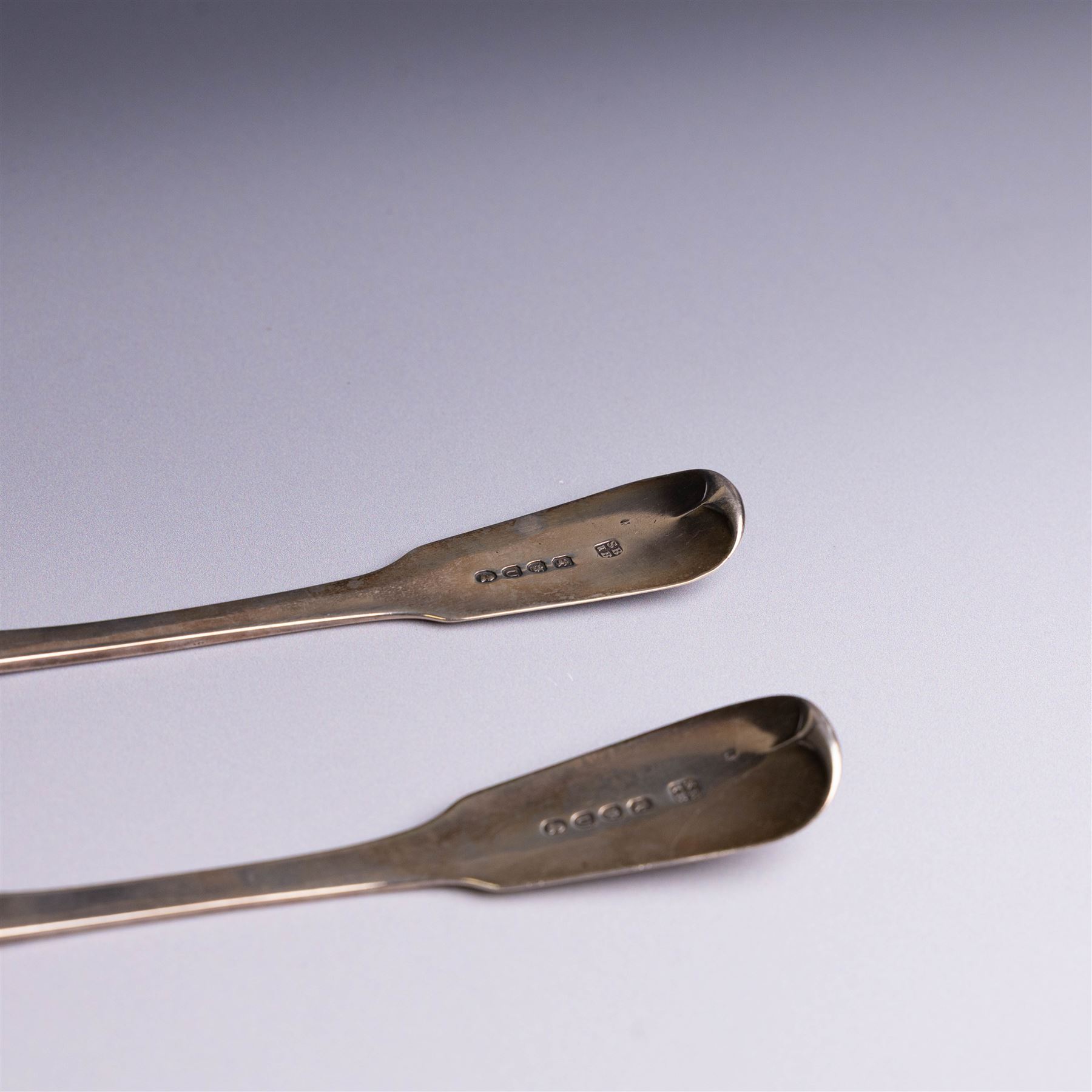 Pair of George III silver Fiddle pattern table spoons, each with bright cut floral and foliate decoration, hallmarked Sarah & John William Blake, London 1815