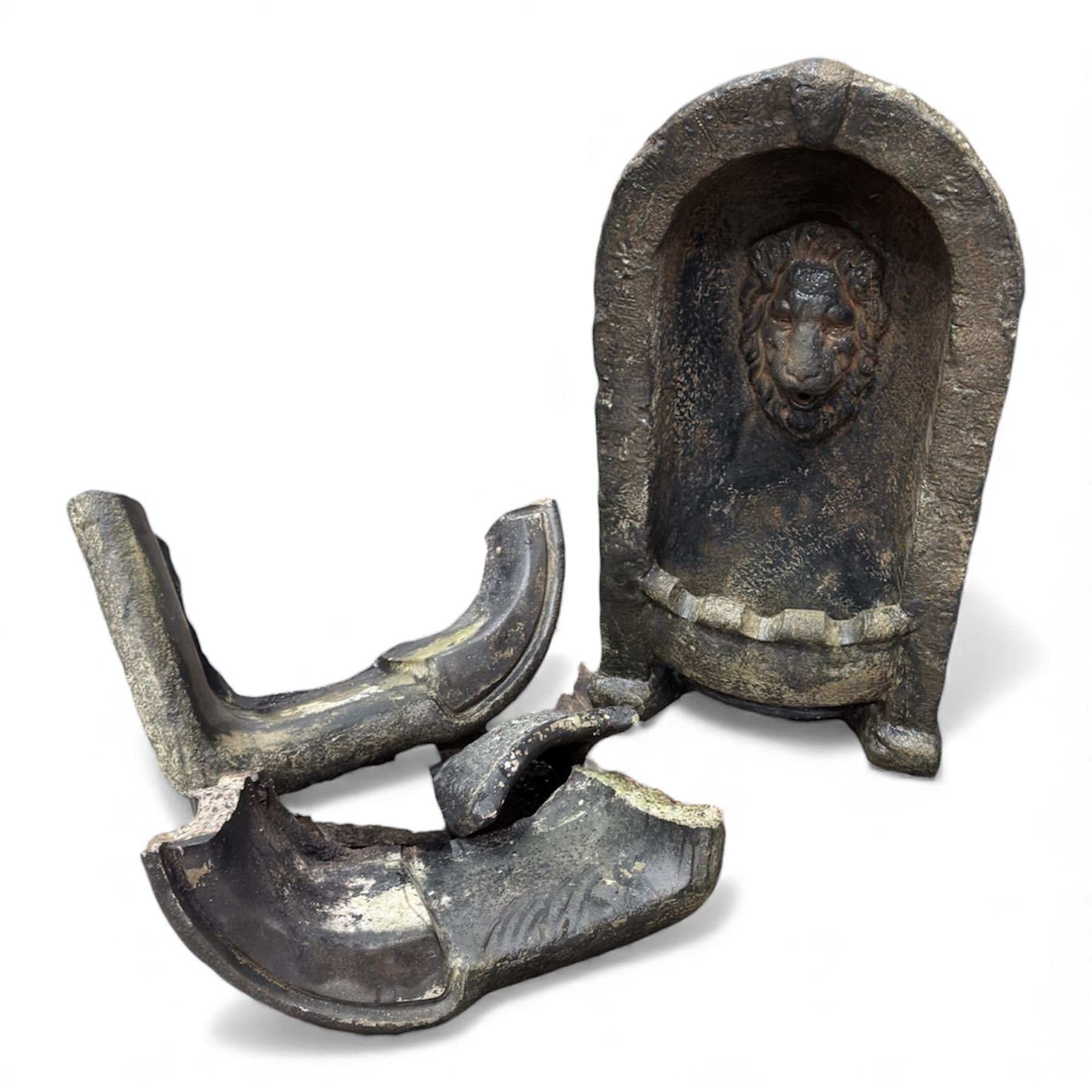 Cast stone fountain with lion mask