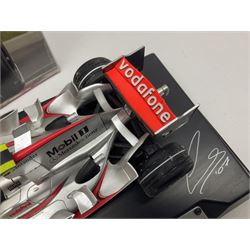 Mattel Hot Wheels 1:18 scale die-cast racing car - Vodaphone McLaren Mercedes; boxed with stand