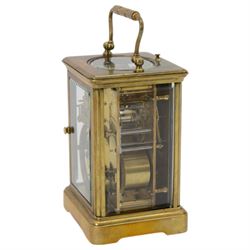 French - Early Edwardian corniche cased 8-day carriage clock, decorative enamel dial with floral garlands, Arabic numerals, minute markers, steel moon hands and conforming alarm setting dial, four rectangular glass panels and an oval viewing glass to the top, with a silvered lever platform escapement and 
timing screws to the jewelled balance, twin train rack striking movement with repeat, sounding the hours, half hours and alarm on a coiled gong.  Original traveling case with viewing glass and key.