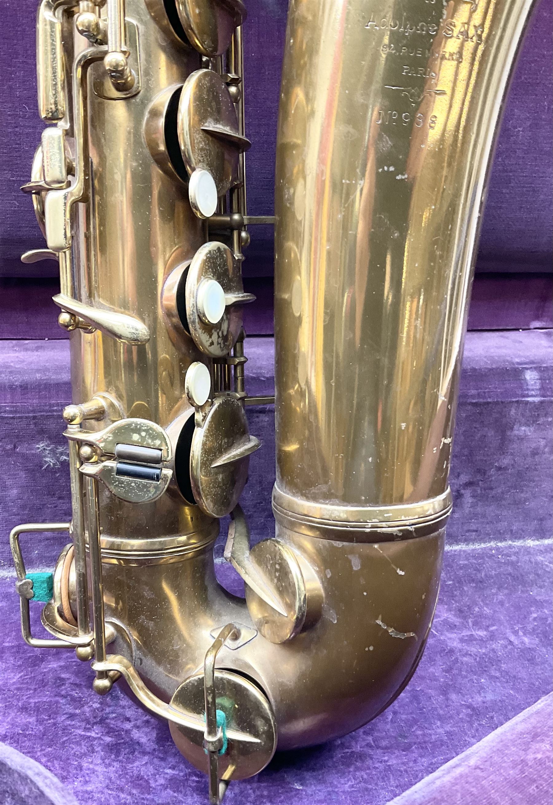 Brass tenor saxophone by Adolphe SAX, 84 Rue Myrha, Paris,  No.938 serial number 12097, H75cm excluding crook; in hard carrying case bearing plaque for Henri Selmer