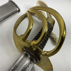 Early 19c French 1st Empire Heavy Cavalry trooper's sword, the 95.5cm double fullered blade with various stamped marks and inscribed Klingenthal 1814 to the back edge, four-bar brass hilt with wire-bound leather grip, knucklebow numbered 139; in polished steel scabbard with two suspension rings L117cm overall