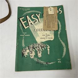 German Hohner student II compact accordion with 26 keys and 12 bass registers in a hard case With tutor