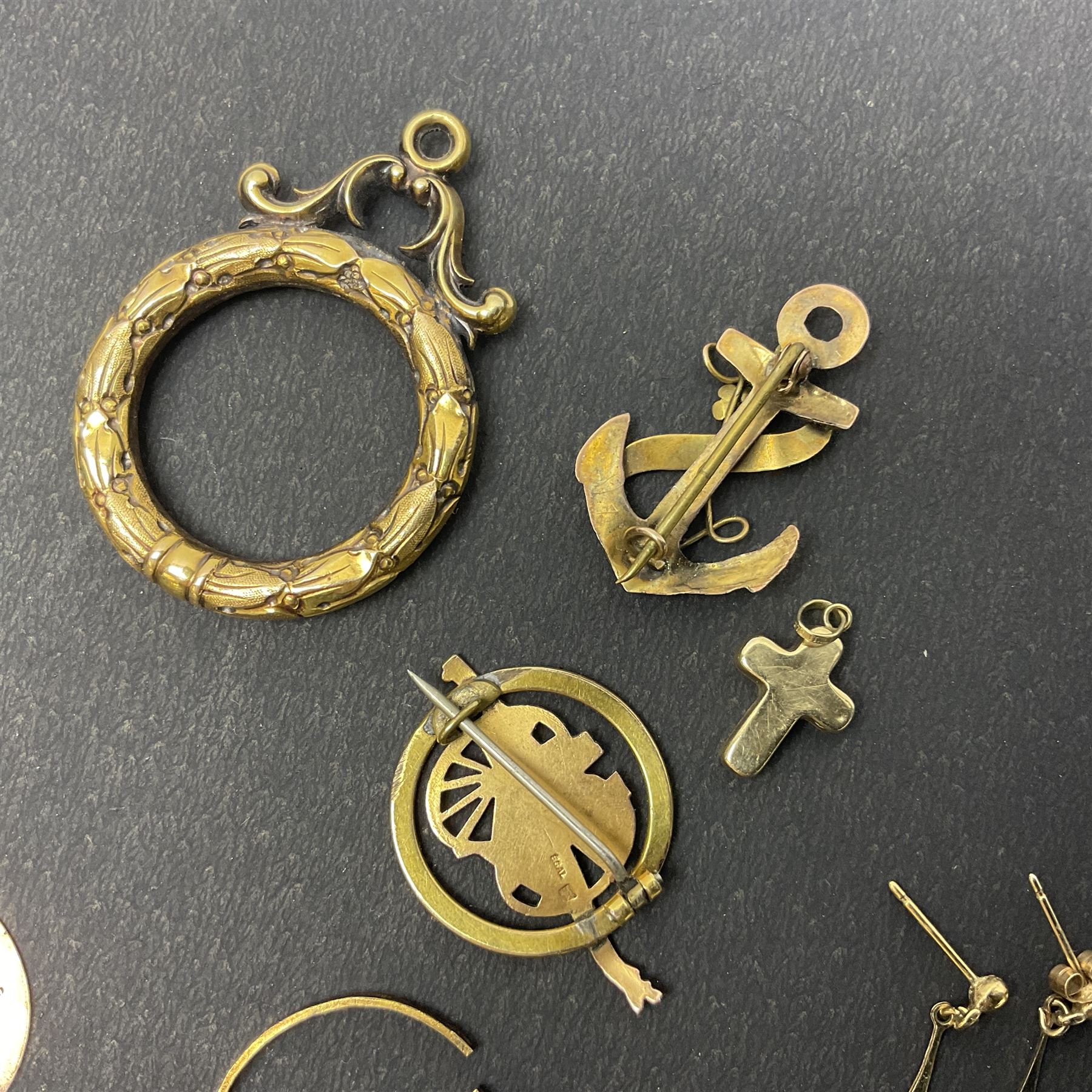 9ct gold jewellery, including sapphire and diamond cluster ring, 'Good Luck' anchor sweetheart brooch, two charms and a pair of stud earrings, together with a 15ct gold brooch commemorating the Battle of Ypres, Berwick Cycling Club medal and a gold wreath pendant