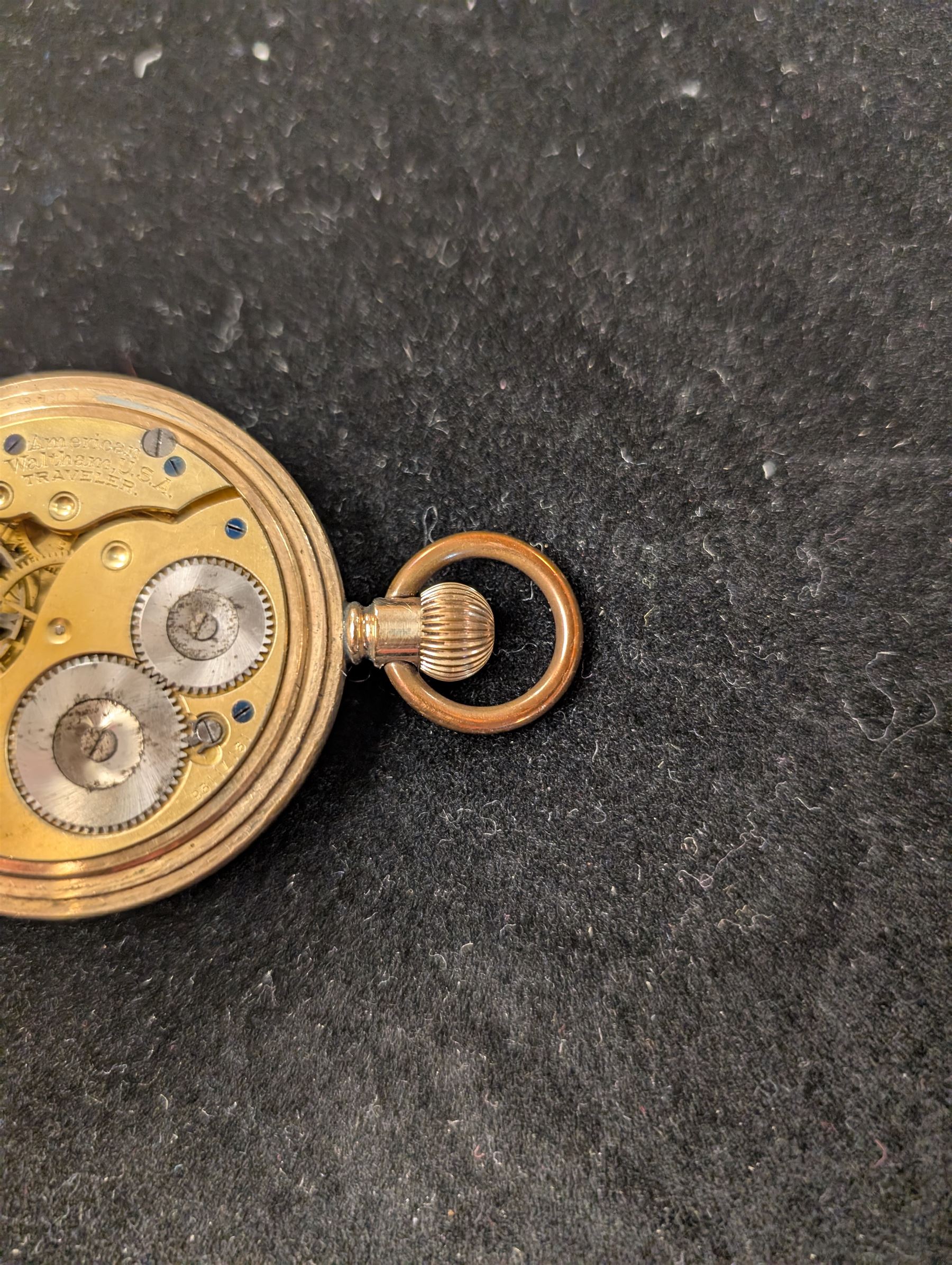 Waltham USA gold plated full hunter pocket watch, the white enamel dial with subsidiary seconds dial, the front cover engraved and embossed with blank cartouche in a floral border, the back cover engraved with stag