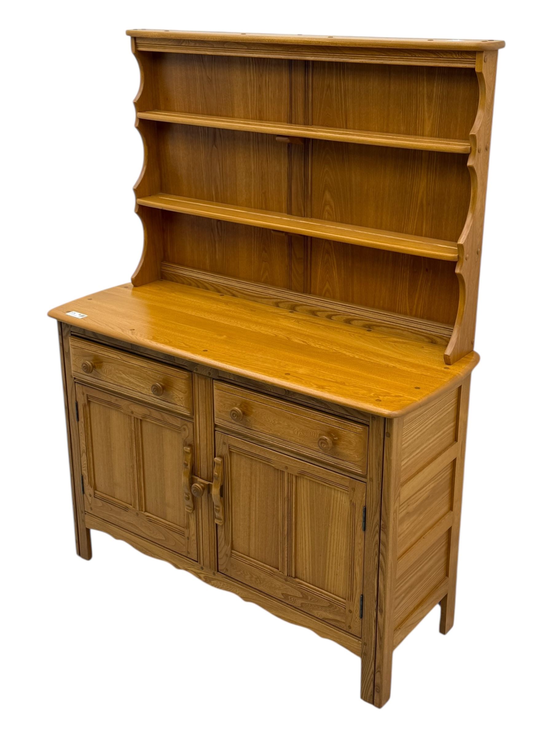 Ercol - golden dawn light elm dresser, plate rack above two drawers and two cupboard doors with sliding wooden lock mechanism 
