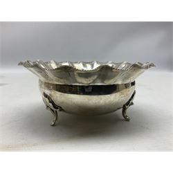 White metal bowl, or circular form with frilled rim, upon three feet, stamped 925, approximate weight 139 grams