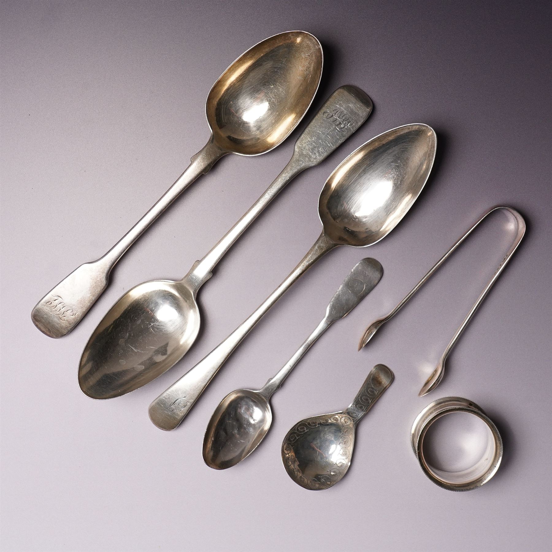 Pair of Victorian silver fiddle pattern table spoons London 1844 Maker James & Albert Savory, George III table spoon by Peter and Ann Bateman, engraved silver caddy spoon Birmingham 1810 Maker Samuel Pemberton and three other silver items 