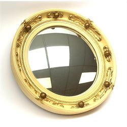 A vintage Atsonea convex mirror, of circular form, the cream frame with gilt detail, D41.5cm.