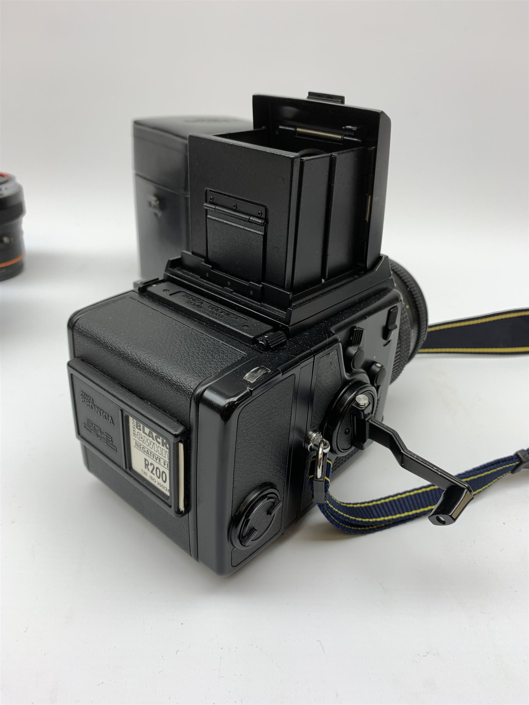 'Zenza Bronica SQ-B' camera fitted with 'Zenza Bronica Zenzanon-PS 1:28 f=80mm' lens, 'Zenza Bronica Zenzanon-PS 1:4 f=150mm' lens and 'Zenza Bronica Zenzanon-S 1:35 f=50mm' lens, with an instruction booklet