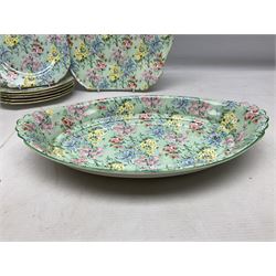 Shelley Melody pattern tea service for six, to include teapot, teapot stand, hot water jug, milk jug, covered sucrier, teacups and saucers, cake plates etc (31)