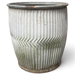 Two20th century galvanised metal dolly tubs, with rolled rims above corrugated bodies centred by chevron bands and circular bases, max W48cm H52cm)