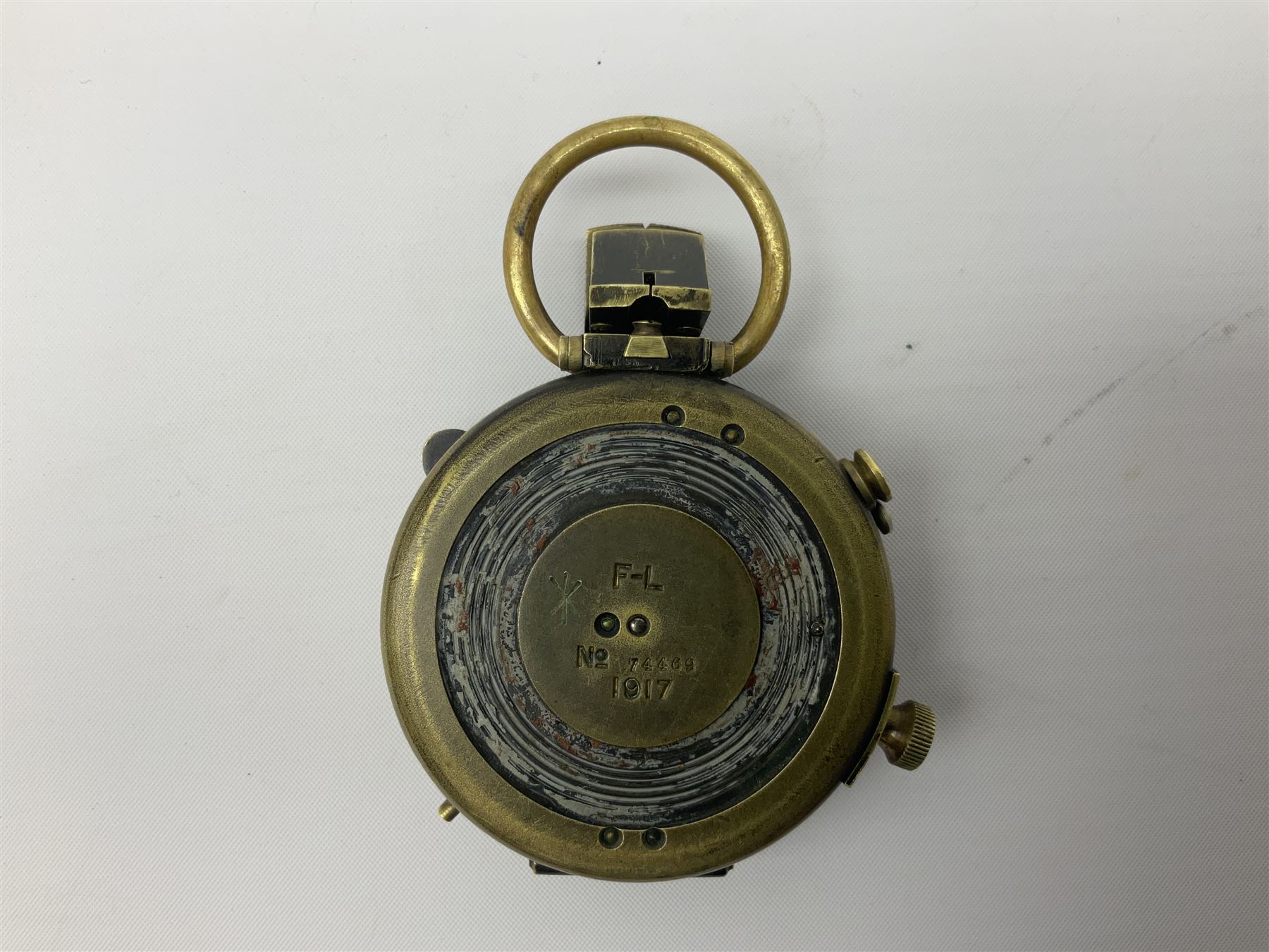 WW1 verner's pattern brass cased marching compass inscribed F-L No.74469 1917; in leather carrying case impressed W. Huddlestone Leatheries Ltd. 1917