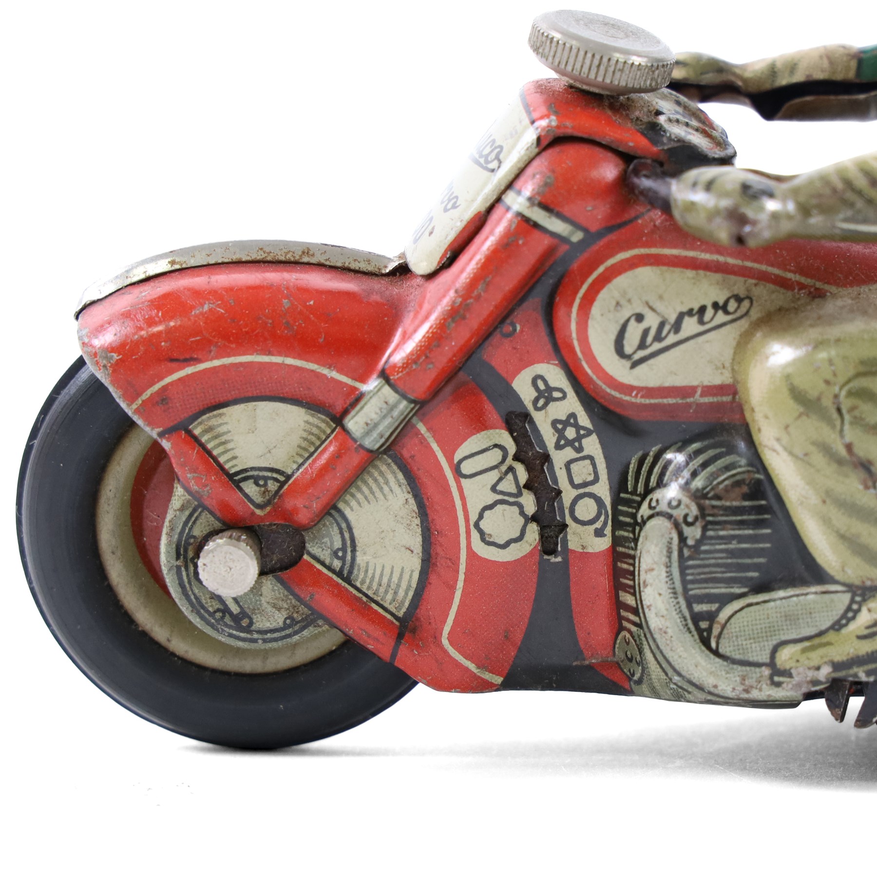 Schuco Curvo 1000 tinplate clockwork motorcycle, in red and cream, with rider in green jacket