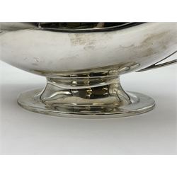 1920s silver twin-handled pedestal bowl, of navette form with twin bifurcated acanthus capped scroll handles, engraved with initial R to body and upon spreading oval foot, hallmarked Hawksworth, Eyre & Co Ltd, Sheffield 1925, including handles H21.8cm