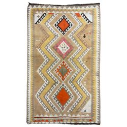 South West Persian Qashgai Kilim, mustard ground and decorated with geometric lozenges and borders 