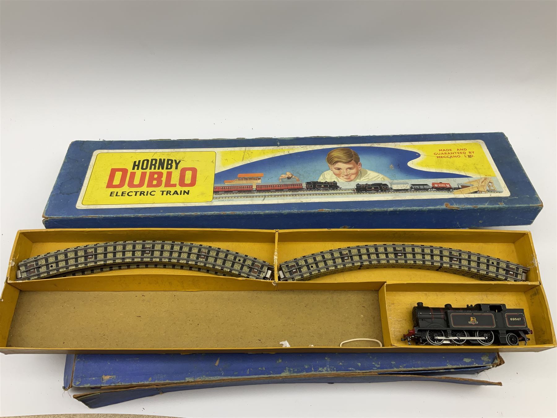 Hornby Dublo - three-rail EDP12 passenger train set with Duchess Class 4-6-2 locomotive 'Duchess of Montrose' No.46232 and tender, two coaches and one length of track, boxed; and three-rail EDP10 passenger set long box with Class N2 0-6-2 tank locomotive No.69567 and track only (2)