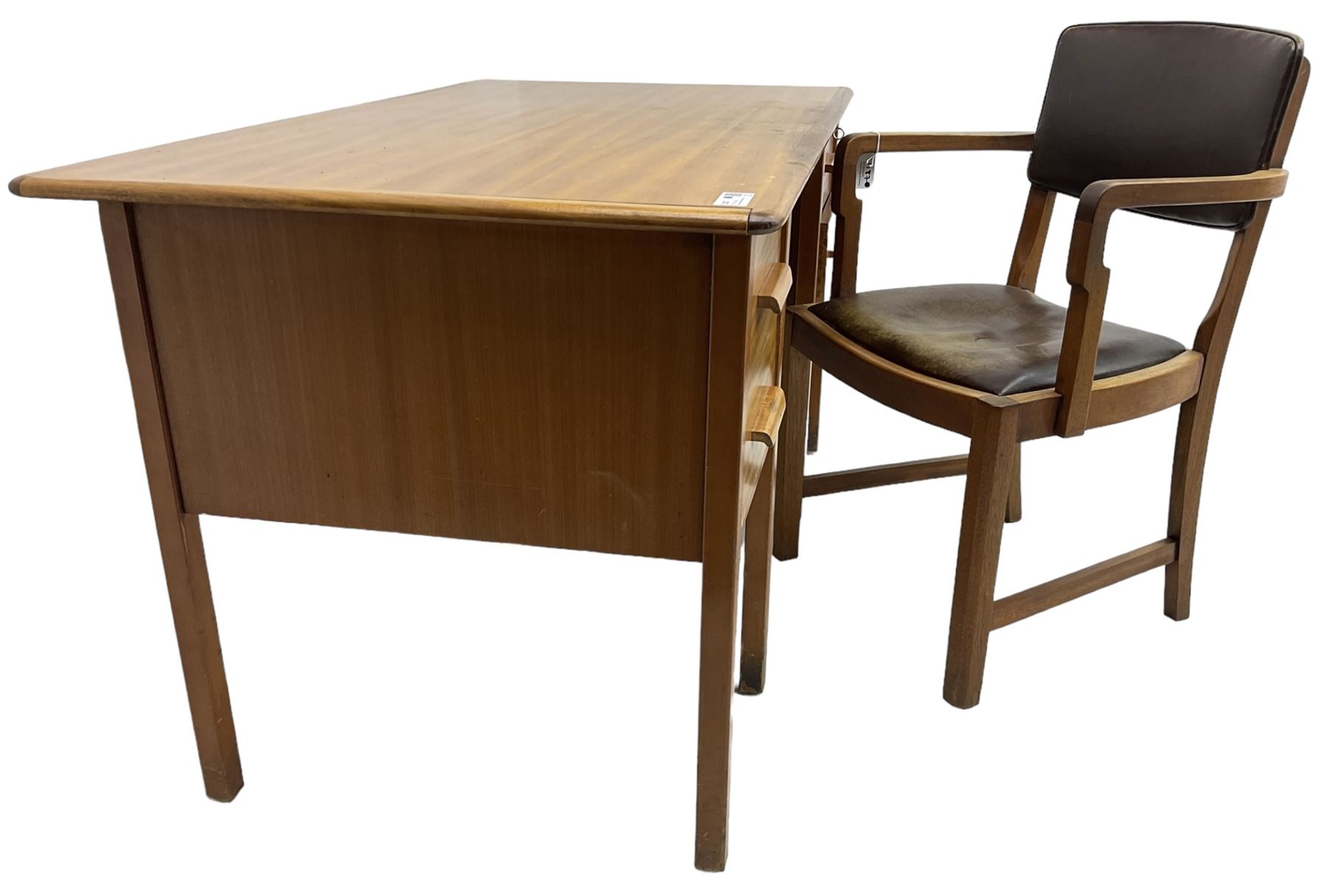 Mid-20th century teak office desk, fitted with four drawers; together with a similar period office desk chair 
