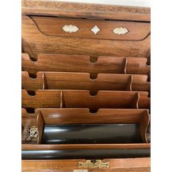 19th century burr walnut correspondence box, the sloped front opening to reveal a fitted interior with perpetual calendar, letter racks, and pen tray between two inkwell recesses, above a pull out draw with recessed brass handle, H41cm L40.5cm D28.5cm