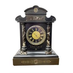 John Cundill Arundel of York - French 8-day striking mantle clock in a Belgium slate and marble case c1890, with a shaped pediment with inlaid contrasting marble and incised decoration, break front case with recessed marble pillars, on a deep plinth with conforming decoration, black slate dial with gilt roman numerals, circular gilt repoussé centre and brass hands, egg & dart slip within a cast brass bezel, rack striking movement striking the hours and half hours on a coiled gong. With pendulum.  