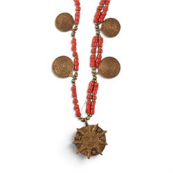 Collection of Middle Eastern jewellery, including silvered multi strand necklace with beadwork and filigree decoration with three cylindrical pendants, pendant necklace with central orange cabochon, beadwork choker and similar  