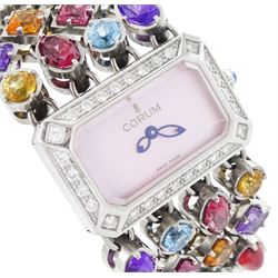 Corum Potpourri ladies stainless steel multi gemstone set quartz wristwatch, Ref. 137.520.47, serial No. 1710972, pink mother of pearl dial, diamond set bezel, on a multi gemstone set bracelet
