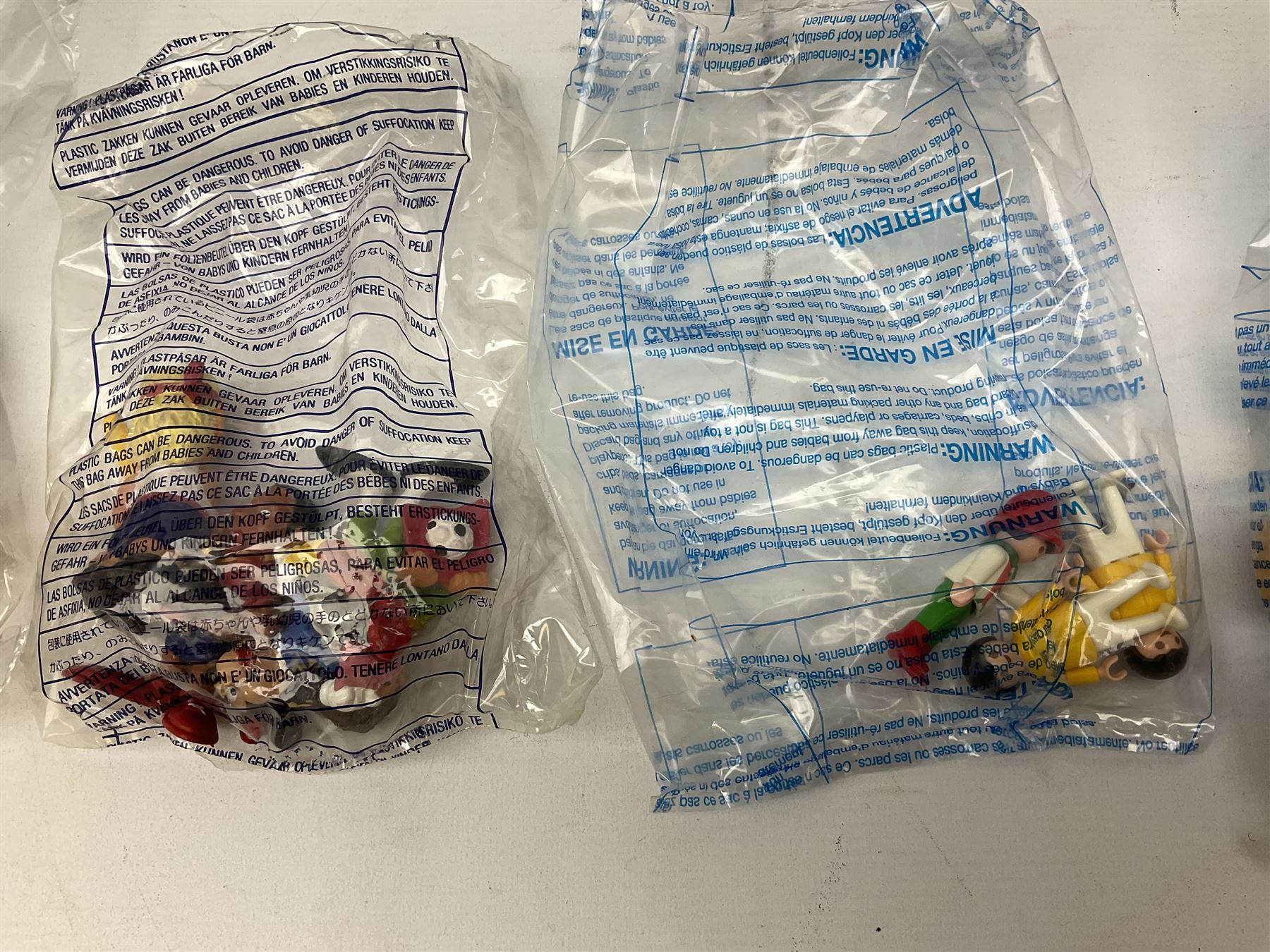 Playmobil - thirteen boxed figures including two Sports Action in unopened boxes; and a large quantity of unboxed figures and accessories