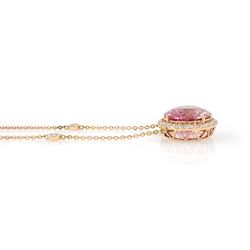 18ct rose gold pink tourmaline and diamond pendant necklace, oval cut tourmaline of 15.41 carat, surrounded by round brilliant cut diamonds, to a trace link chain necklace set with four diamonds, stamped 750, total diamond weight 1.22 carat, with World Gemological Institute report