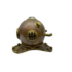 Reproduction US navy deep sea diver's copper and brass helmet, with plaque engraved ‘US Navy Diving Helmet Mark V Morse Diving Equipment Co Inc, Boston MA', H38.5cm