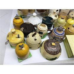 Large collection of honey pots, of various shapes, to include examples from Crown Devon, Marutomo ware, W.H Gloss, Goebel etc 