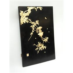 An early 20th century Japanese Shibayama panel, depicting three birds seated upon a blossoming branch in ivory and mother of pearl, with applied ivory character mark panel lower left, H45.5cm L30cm. 