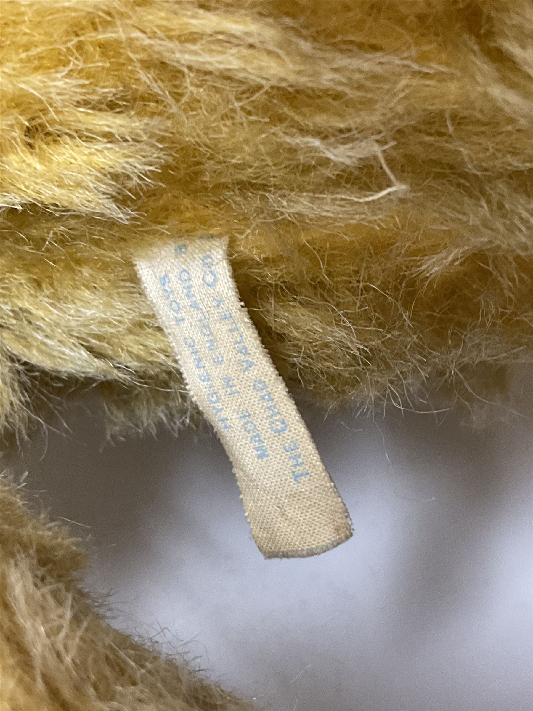 Large post-war Chad Valley plush covered teddy bear with revolving head, applied eyes, vertically stitched nose and mouth, jointed limbs and growler mechanism; stitched label to right foot and Hygenic Toys label to right side H73cm