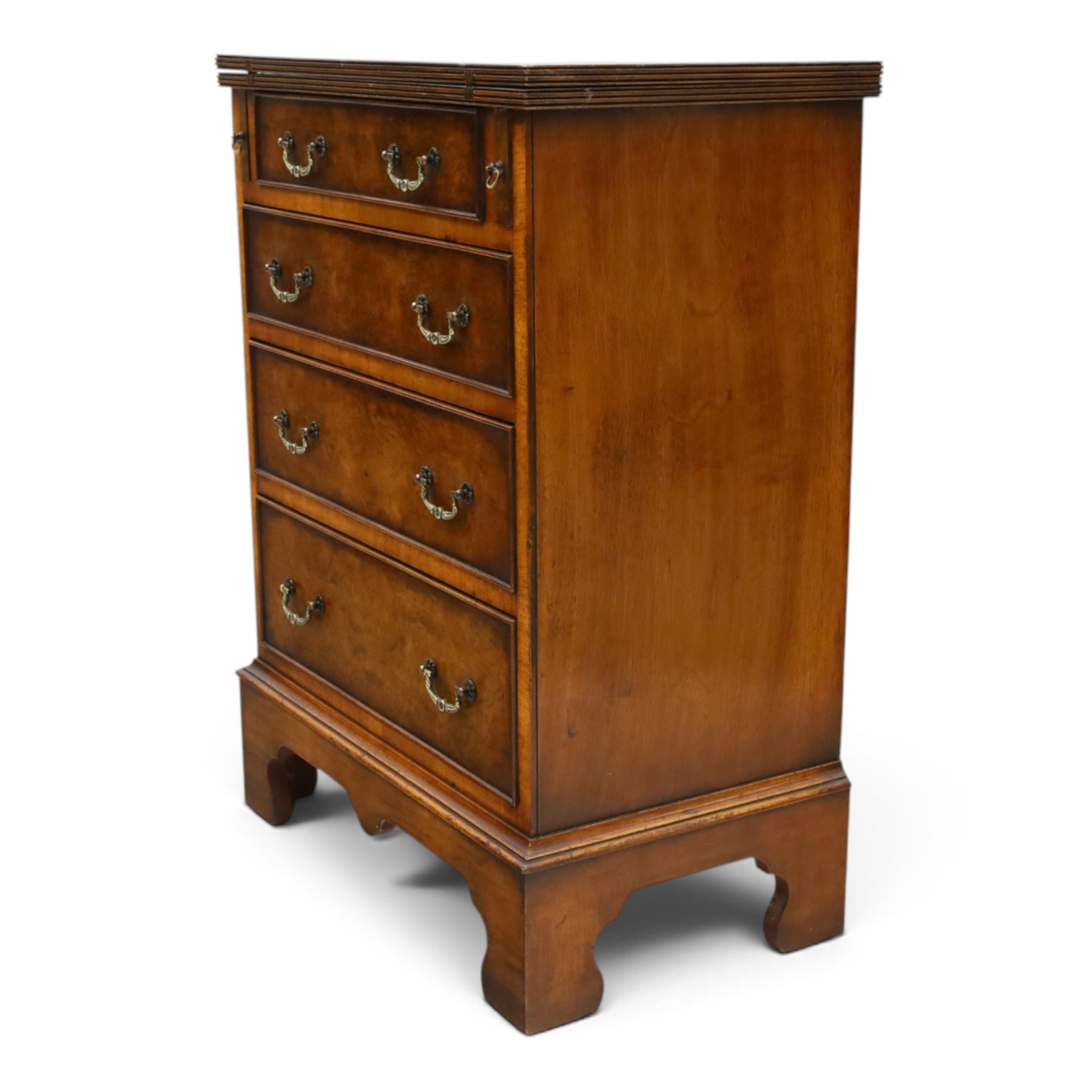 Reprodux - Georgian design figured and burr walnut bachelors chest, rectangular hinged-fold over top with reeded edge supported by stays, over four long graduating cock-beaded drawers, lower moulded edge on bracket feet