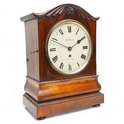 Brooks of London- Regency 8-day rosewood bracket clock c1825, with a serpentine shaped pediment and foliate carving on an ogee stepped base with bun feet, 8