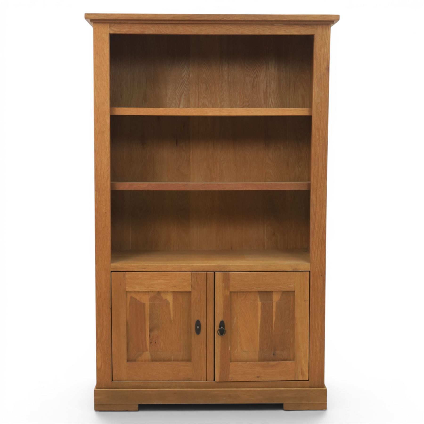 Light oak open bookcase fitted with three shelves, two cupboards, below