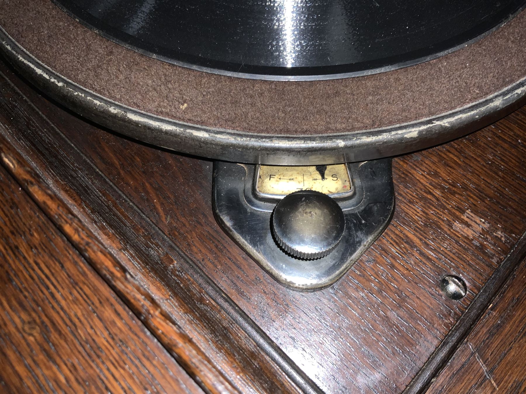 Early 20th century ‘HMV' 202 cabinet gramophone, oak cased, moulded top with foliate carved moulding hinges to reveal gramophone, two doors enclosing horn, on turned supports joined by moulded stretcher rails