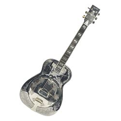 Ozark metal cased resonator guitar with all over chased foliate decoration to the polished finish and mother-of-pearl inlay to the fretboard L100cm; in Stagg hard carrying case